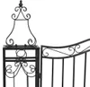A close-up view of a black wrought iron garden gate. Produktbild-Vorschau
