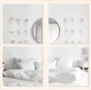 A collage of four images showing a bedroom setting with a bed and wall decorations. Produktbild-Vorschau