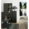 A modern living room with a gray dresser, coffee table, and sofa. Voir les images du produit