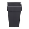 A dark gray square planter is shown against a white background. Voir les images du produit