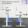 Two adjustable height desks are shown against a white and gray background. Podgląd zdjęcia produktu