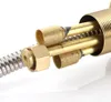 A close-up view of the internal components of a kitchen faucet, showing brass fittings and a flexible metal hose. Produktbild-Vorschau