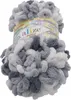 A ball of fluffy yarn with a colorful label. Anteprima dell’immagine prodotto