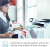 A woman is using a printer in an office setting. Podgląd zdjęcia produktu
