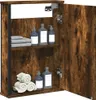 A wooden bathroom cabinet with shelves and bottles of soap or lotion. Náhled obrázku produktu