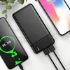 A black power bank is shown charging two smartphones, with one displaying a charging percentage. Produktbild-Vorschau