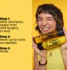 A person holding two bottles of hair product with instructions on the left. Podgląd zdjęcia produktu