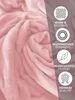 A close-up of a pink textured fabric, likely a blanket or sheet, with marketing icons and text overlaid on the right side. Produktbild-Vorschau