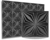 Two dark gray 3D wall panels with a geometric starburst pattern are displayed against a white background. One panel is larger and in the foreground, while a smaller panel is positioned behind and to the left. Produktbild-Vorschau
