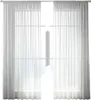 A window covered by sheer white curtains. Produktbild-Vorschau