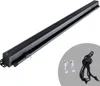 A black retractable awning is shown against a white background, with some accessories in a gray circle at the bottom right. Produktbild-Vorschau