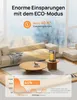 A living room scene with a sofa, coffee table, and a small heater on a side table, with a graphic overlay showing energy savings. Produktbild-Vorschau