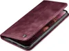 A burgundy flip case for a smartphone, shown from a diagonal angle with the cover partially open. Produktbild-Vorschau