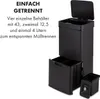 A black multi-compartment trash can with its lid open, showing the interior and the pull-out drawers below. Text on the left describes its features. Produktbild-Vorschau