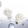 Two white wireless earbuds are shown floating against a light gray and white background with water droplets. Anteprima dell’immagine prodotto