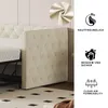 A close-up view of a cream-colored upholstered bed frame with tufted detailing and nailhead trim, next to a mattress. Icons and text describing product features are on the right side. Produktbild-Vorschau