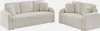 Two cream-colored sofas are shown against a white background. Anteprima dell’immagine prodotto