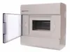 A white electrical distribution box with its transparent door open, showing the internal mounting rails. Náhled obrázku produktu