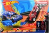 The image shows the packaging of a Carrera GO!!! Hot Wheels race track set, featuring two toy cars on a race track. Náhled obrázku produktu