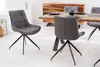 A dining room setting with a wooden table and chairs. Produktbild-Vorschau