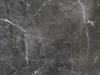 A close-up, textured view of a dark gray marble surface with white veining. Produktbild-Vorschau