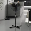 A black Clatronic stand fan is shown in a modern living room setting. Podgląd zdjęcia produktu