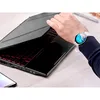 A hand wearing a smartwatch is shown closing the lid of a laptop with a red illuminated keyboard. Anteprima dell’immagine prodotto