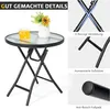 A collage of images showing a small round glass-top table with a black metal frame, along with close-ups of its structural features. Produktbild-Vorschau