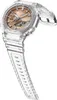 A clear, studio shot of a transparent G-Shock watch with a rose gold face. Voir les images du produit