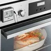 A digital meat thermometer is attached to the side of an oven, with its probe inserted into a roast in a baking dish inside the oven. Anteprima dell’immagine prodotto