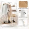 A clothing rack with clothes on it and shelves holding various items, with close-up detail shots of product features on the right side. Náhľad obrázku produktu