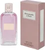 A bottle of Abercrombie & Fitch First Instinct Eau de Parfum for women and its packaging are displayed side-by-side against a white background. Náhľad obrázku produktu