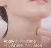 A close-up shot of a person's neck and chin area, with a pink balm stick being applied to the neck. Text overlays the bottom of the image. Náhled obrázku produktu