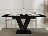 A black high-gloss dining table with a V-shaped base, set with plates, glasses, and a water bottle, in a modern dining room setting. Anteprima dell’immagine prodotto