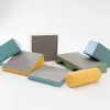 A collection of colorful foam building blocks arranged on a white background. Produktbild-Vorschau