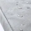 A close-up of a gray textured surface with water droplets on it. Náhled obrázku produktu