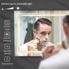 A man is shaving in front of a lighted mirror. Náhľad obrázku produktu