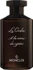 A product shot of a dark brown glass perfume bottle with a black cap. Voir les images du produit