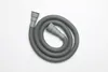 A coiled grey flexible hose with grey connectors on a white background. Produktbild-Vorschau