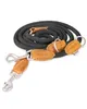 A coiled black rope dog leash with leather accents and metal clasps, presented on a white background. Produktbild-Vorschau