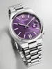 A close-up studio shot of a Citizen watch with a purple dial and silver metal band. Produktbild-Vorschau