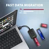 A laptop connected to an external adapter, with two M.2 SSDs (NVMe and SATA) shown next to it, illustrating data migration. Náhled obrázku produktu