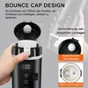 A hand is shown opening the lid of a black electric travel mug, with text overlays describing features. Produktbild-Vorschau