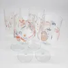 Four clear wine glasses with decorative patterns are arranged on a white background. Náhľad obrázku produktu