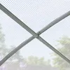 Close-up view of the internal structure of a greenhouse, showing the metal frame and the white transparent PE plastic sheeting. Produktbild-Vorschau