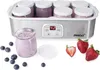 A yogurt maker with several glass jars filled with yogurt and surrounded by blueberries and strawberries. Produktbild-Vorschau