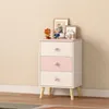 A child's dresser with decorative items on top, set against a plain wall. Náhľad obrázku produktu