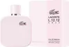 A bottle of Lacoste L.12.12 Rose Eau De Parfum spray and its packaging. Anteprima dell’immagine prodotto