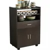 A dark brown kitchen cart with shelves, a drawer, and cabinet doors, filled with various kitchenware. Náhled obrázku produktu