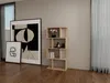 A wooden bookshelf with books and decorative items in a room with artwork and a window with curtains. Produktbild-Vorschau